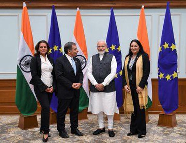 Members of European Parliament (left and second from left) with Prime Minister Narendra Modi in New Delhi on October 28, 2019. To Mr. Modi’s left is Brussels-based British PIO Madi Sharma, whose Twitter account describes her as an “international business broker”. Photo: Twitter/@PIB_India