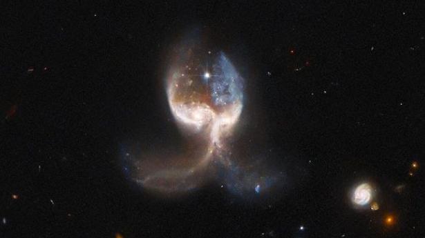 NASA telescope spots colliding galaxies shaped like ‘angel wings’ in deep space