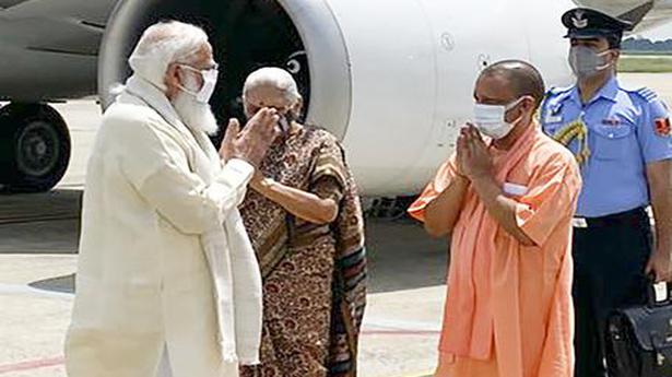 PM Modi lands in Varanasi, received by Uttar Pradesh Governor Anandiben, CM Yogi Adityanath