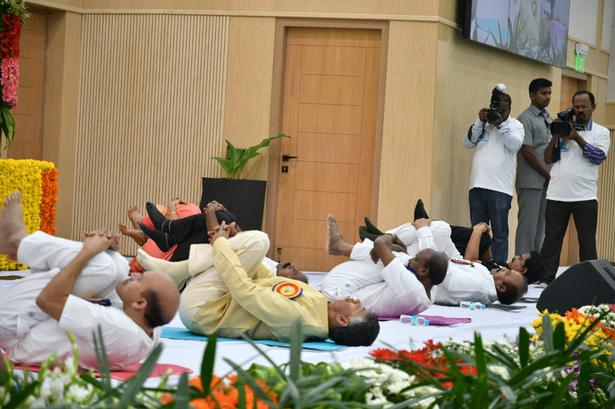 Andhra Pradesh Chief Minister N Chandrababu Naidu participates in a yoga session at Undavalli near Vijayawada on June 21, 2018. photo.