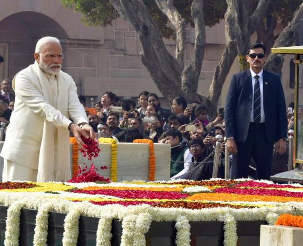 Prime Minister Narendra Modi paying homage at the Gandhi Samadhi during the Martyrs' Day at Rajghat in New Delhi on Wednesday.