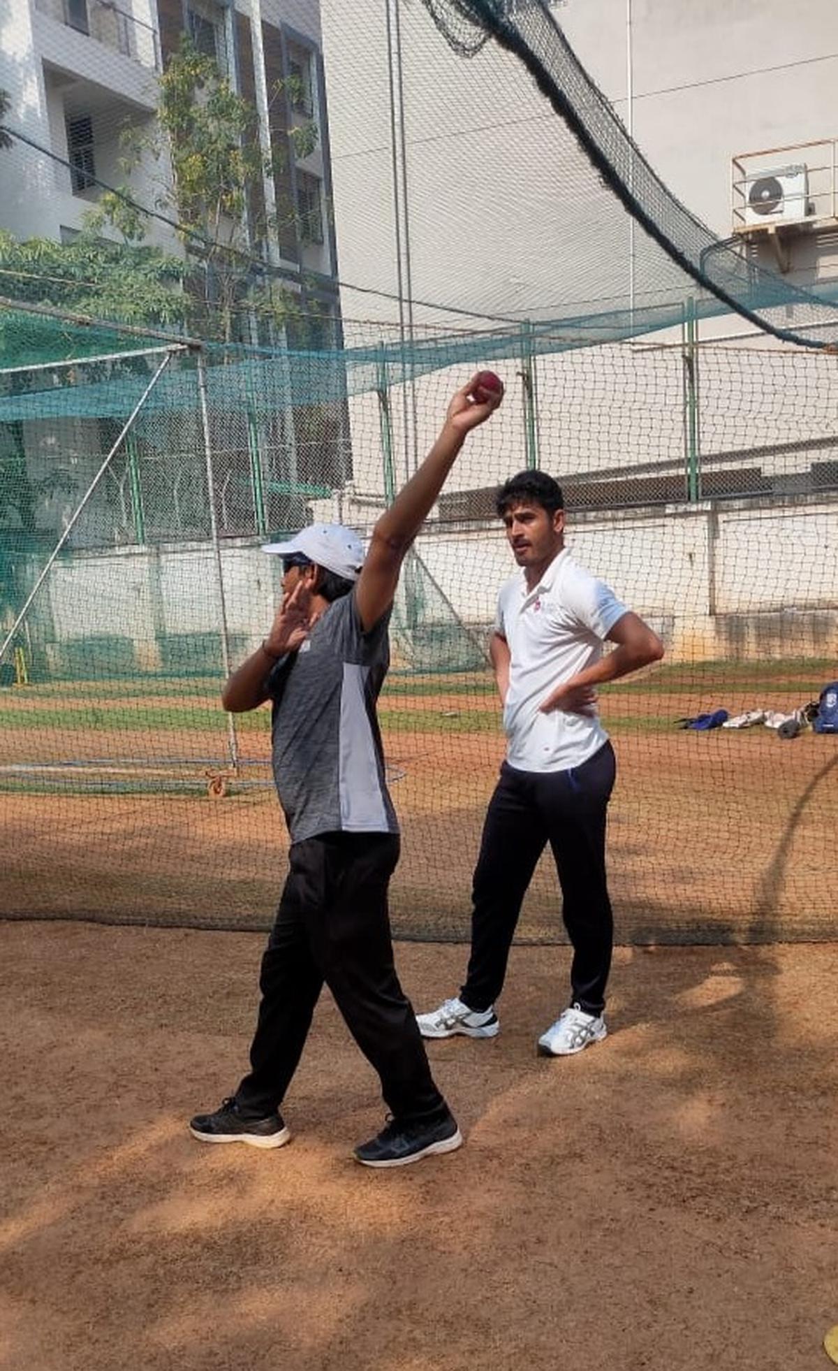 Mukesh Choudhary working on pace bowling skills with coach Rajesh Mahurkar at the 22 Yards Cricket Academy. 