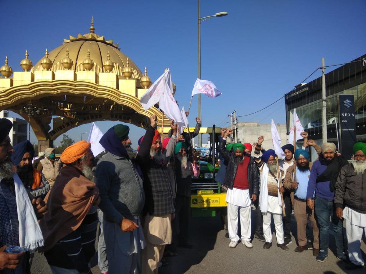 group of farmers in Punjab's Amritsar assemble at city's golden gate as they prepare to march to Delhi in protest against Centre's agriculture laws.