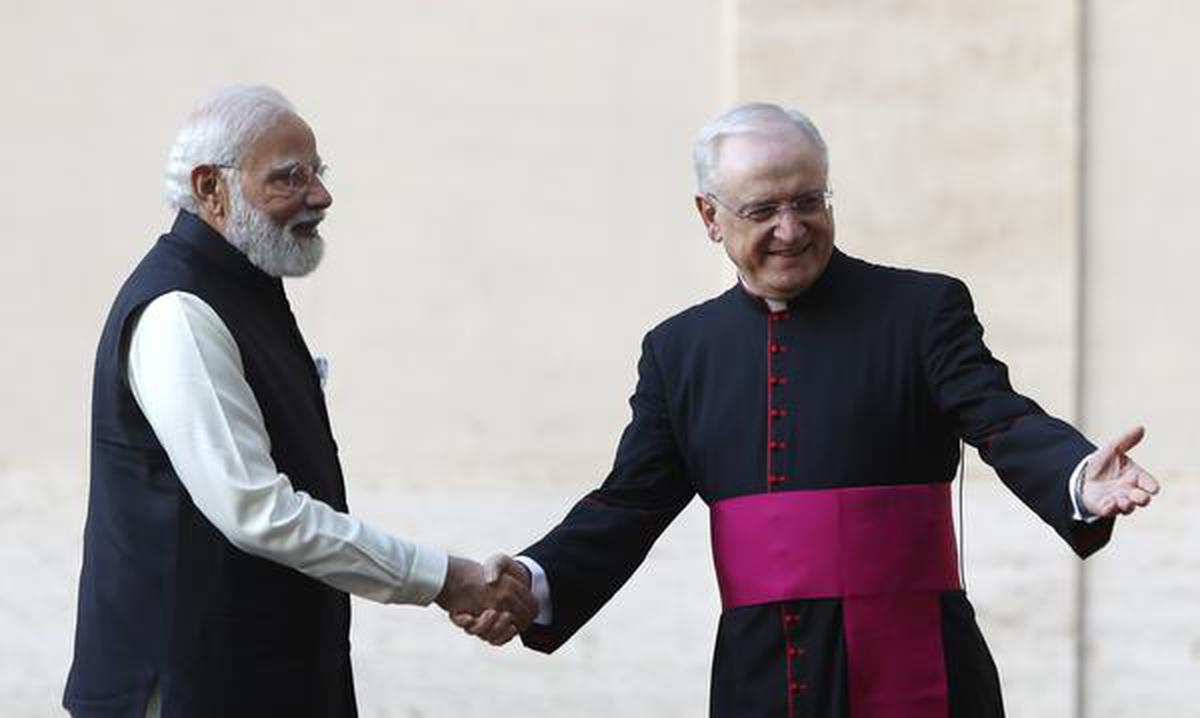 Prime Minister Narendra Modi is greeted by the Head of the Papal Household, Mons. Leonardo Sapienza as he arrives for a meeting with Pope Francis at the Vatican on October 30, 2021.