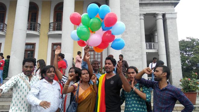 The LGBT community celebrates at Town Hall in Bengaluru on Thursday.