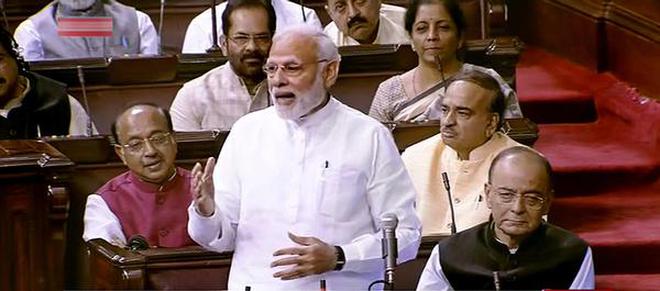 Prime Minister Narendra Modi speaks in the Rajya Sabha during the monsoon session of Parliament in New Delhi on August 9, 2018.
