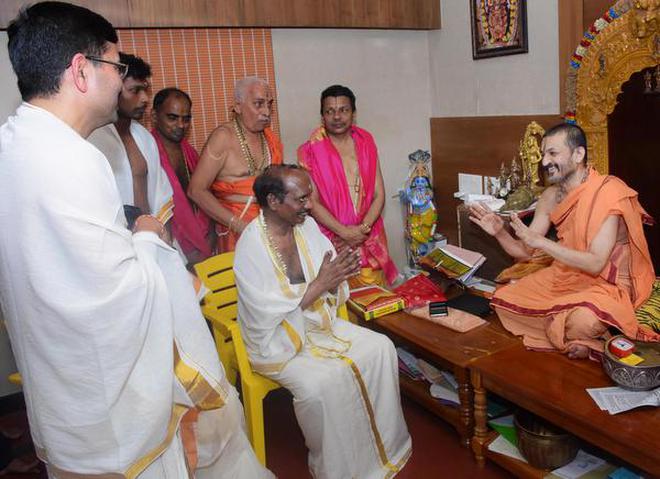 ISRO chairman K. Sivan meets seer Vidyadheesha Tirtha at the Sri Krishna mutt in Udupi on July 7. Photo: Special Arrangement