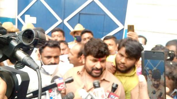 Former minister comes out of jail to welcome by Congress MLA