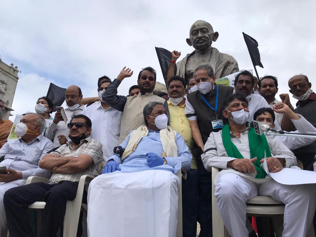 Congress MLAs and MLCs protest in support of farmers, at Gandhi statue in Vidhana Soudha before going to Assembly and Council sessions, during the Bharat Bandh, in Bengaluru on December 08, 2020.