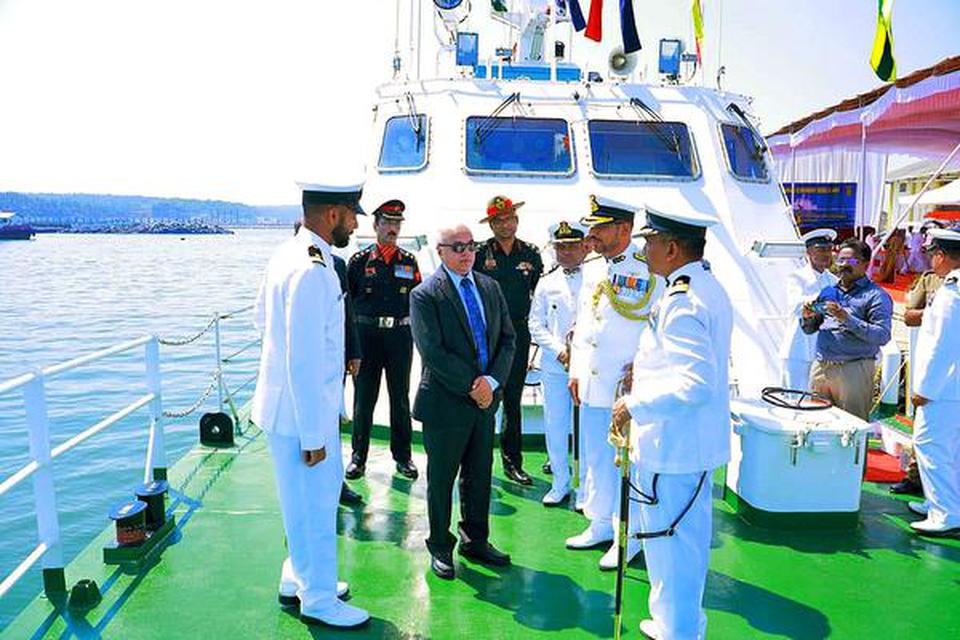 ‘Chief Secretary Tom Jose with Coast Guard officials on board the new vessel commissioned at Vizhinjam on Wednesday.  