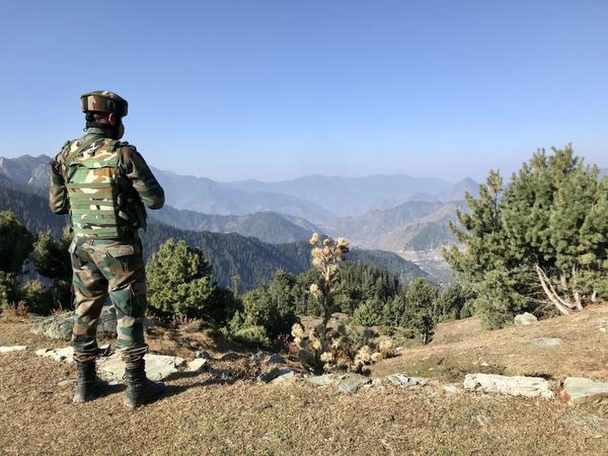 A soldier stands on guard in Tangdhar sector close to the Line of Control in Jammu and Kashmir’s Kupwara district.