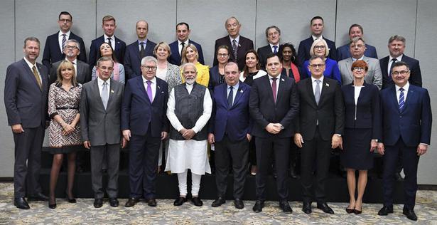 In this photo released by government of India, Prime Minister Narendra Modi, poses with a delegation of European Parliament members who called on him in New Delhi on Monday, October 28, 2019.