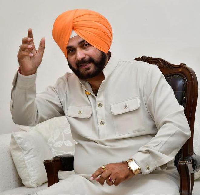 Navjot Singh Sidhu addressing media persons in Chandigarh on Tuesday, August 21 2018.