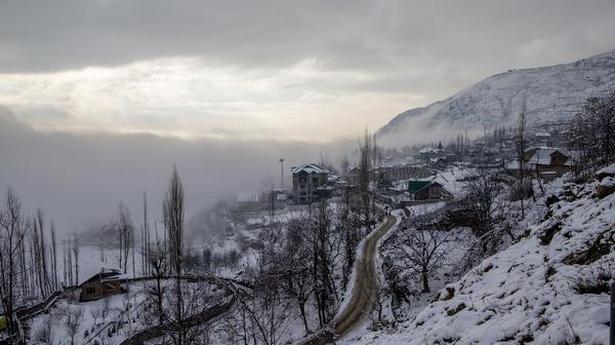 Snowfall blankets Kashmir