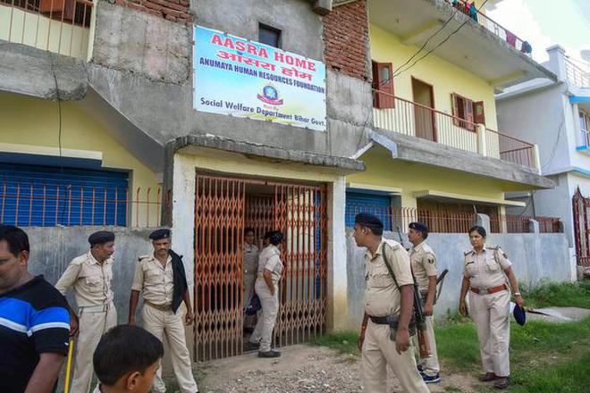 Police personnel at the Aasra Shelter Home in Patna on August 12, 2018 after the death of two inmates under mysterious circumstances.