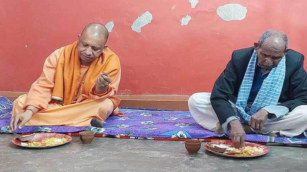 Adityanath eats at Dalit household, targets Samajwadi Party