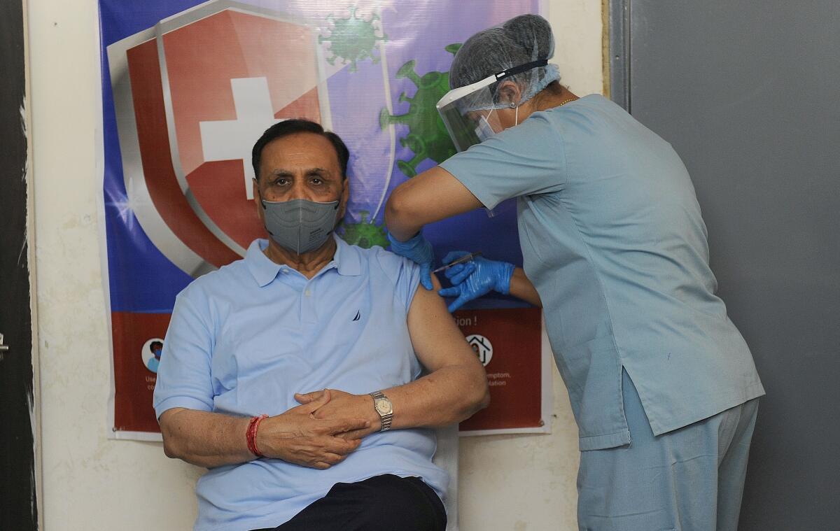 Gujarat CM Vijay Rupani getting Covid-19 vaccine at Government Hospital in Gandhinagar on April 21, 2021.