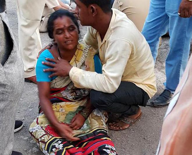 Left to grieve: Relatives of people lynched by villagers in Raainpada, near Dhule.