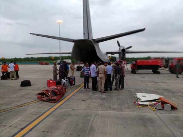 A flight carrying relief materials to flood-hit Kerala ready to take off from Vijayawada.