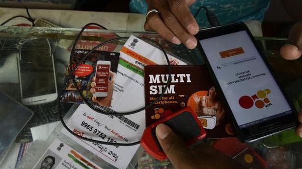 Cabinet okays changes in laws for optional seeding of Aadhaar with bank accounts, mobile connections