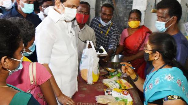 TN CM visits ration shops, inspects distribution of Pongal gifts