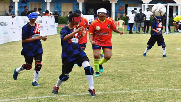 Visually impaired students get a taste of the beautiful game