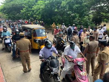 Police checking e-passes of two-wheelers and vehicles with Chennai registration numbers, on Friday, in Paranur. Photograph used for representational purposes only