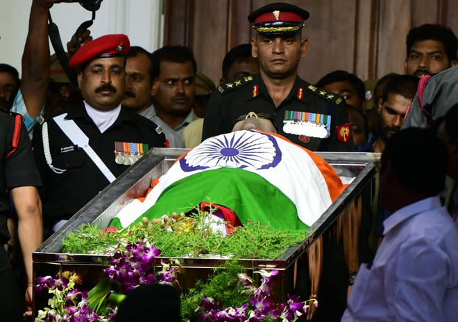 Image result for fittingly for Karunanidhi wrapped with tricolor