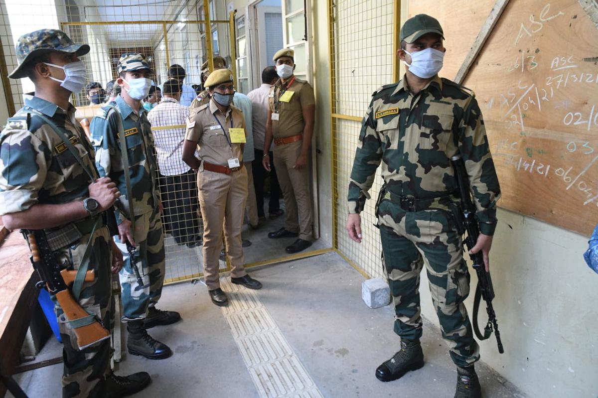 Security personnel keeping a vigil at the Government College of Technology, a counting centre for the Assembly elections in Coimbatore on May 2, 2021.