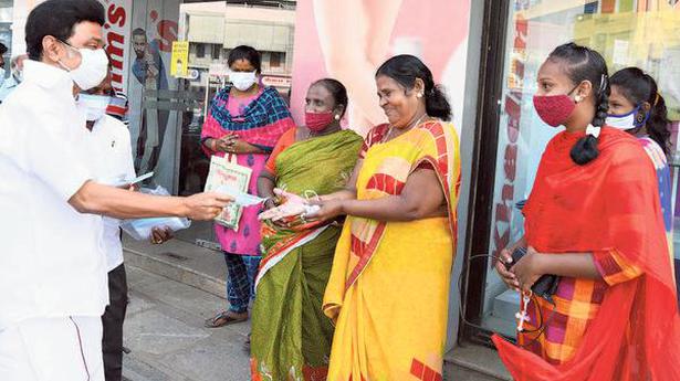 CM springs a surprise, distributes masks to commuters in Chennai