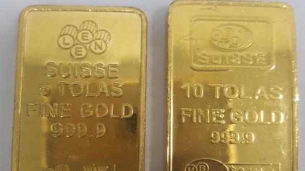 Two passengers held for smuggling gold