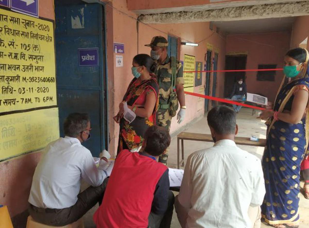 Women voters waiting to exercise their franchise at a polling booth in Danapur, near Patna on Tuesday, November 3, 2020.