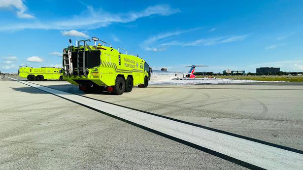 Plane catches fire at Miami airport, three injured