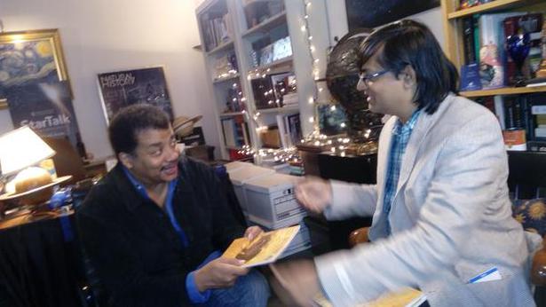 A special moment in JoTT’s timeline. Sanjay Molur presents Neil deGrasse Tyson, the renowned science communicator, with a copy of JoTT that featured a new species of Western Ghats frog named after him.