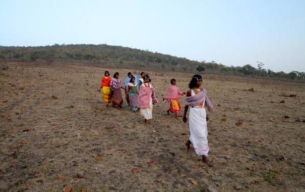 A group of women on their way to the Niyamraja festival