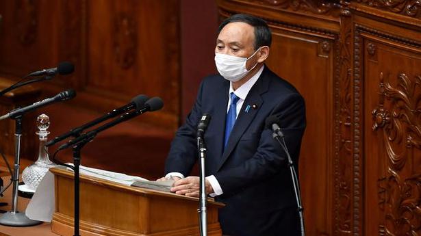 Japan PM vows to press ahead with Olympics amid virus surge