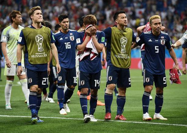 Japan players shows appreciations to the fans after their defeat against Belgium in Rostov-on-Don.