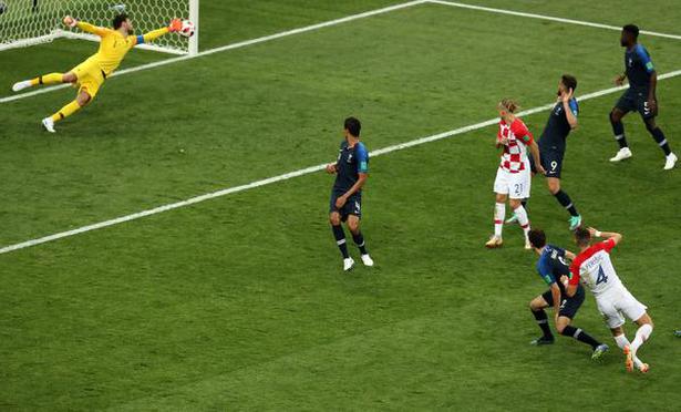 Croatia’s Perisic scores his team’s first goal against France in the FIFA World Cup 2018 finals.