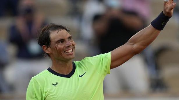 Blinded by the light as Nadal reaches 15th French Open quarter-final