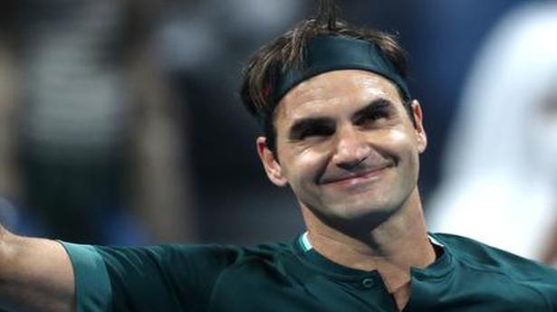 After year-long layoff, Federer returns with a win in Doha