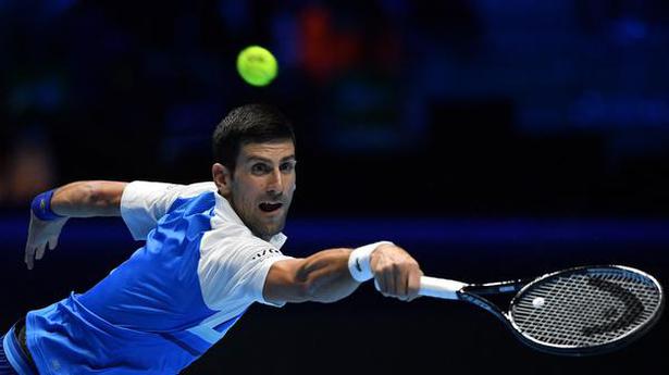 Djokovic clinches a semifinal spot