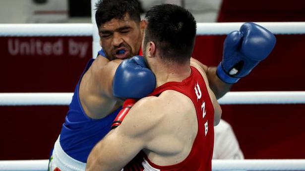Gutsy Satish Kumar's debut Olympics ends with loss to world champ in boxing quarterfinals
